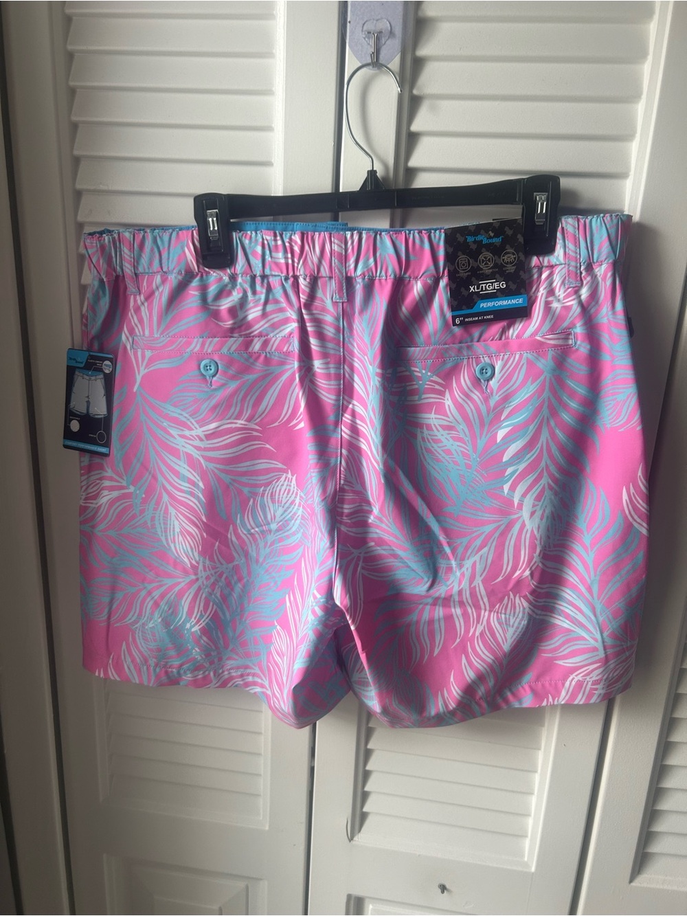 Men's Pink Tropical Swim Trunks with Light Blue Leaf Print - Picture 2 of 4